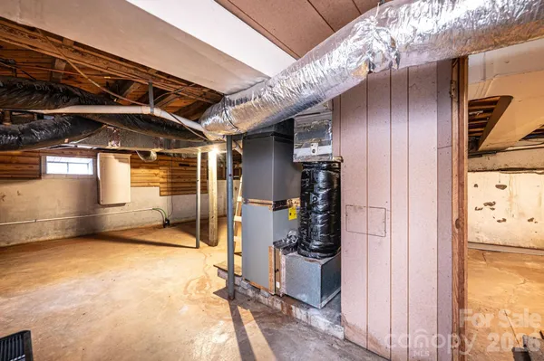 a view of a room with wooden walls