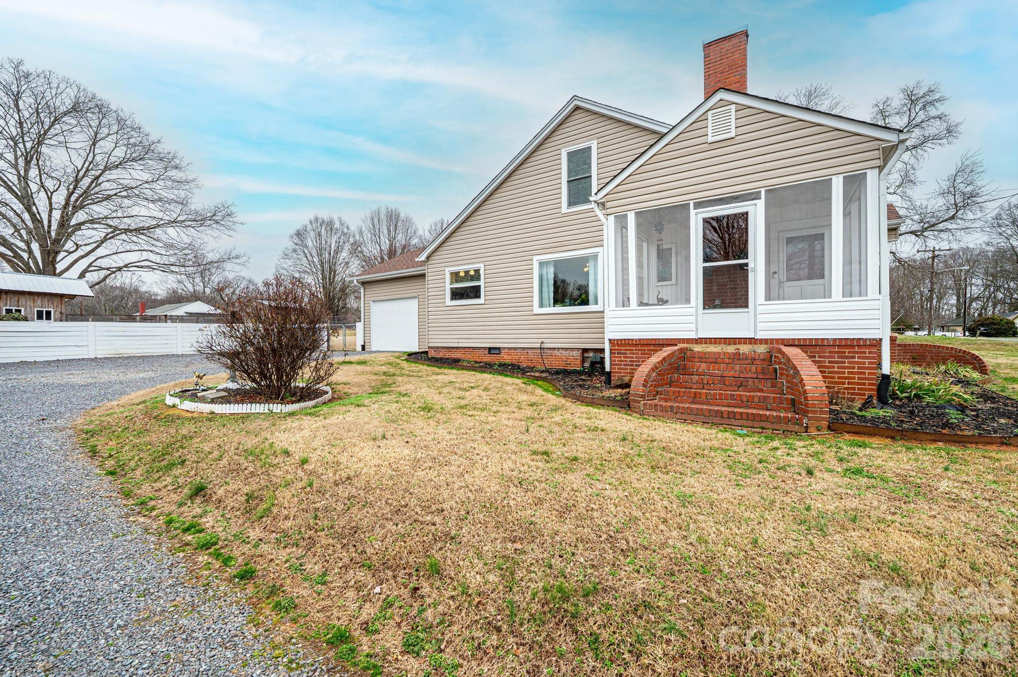 235 Spring Street Mocksville, NC 27028 - Photo 3 of 41 a house view with a outdoor space