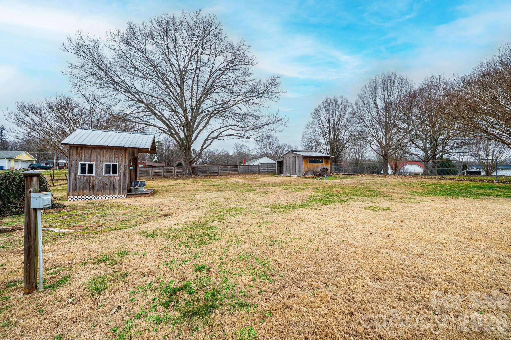 235 Spring Street Mocksville, NC 27028 - Photo 40 of 41 a view of a yard with a house in the background