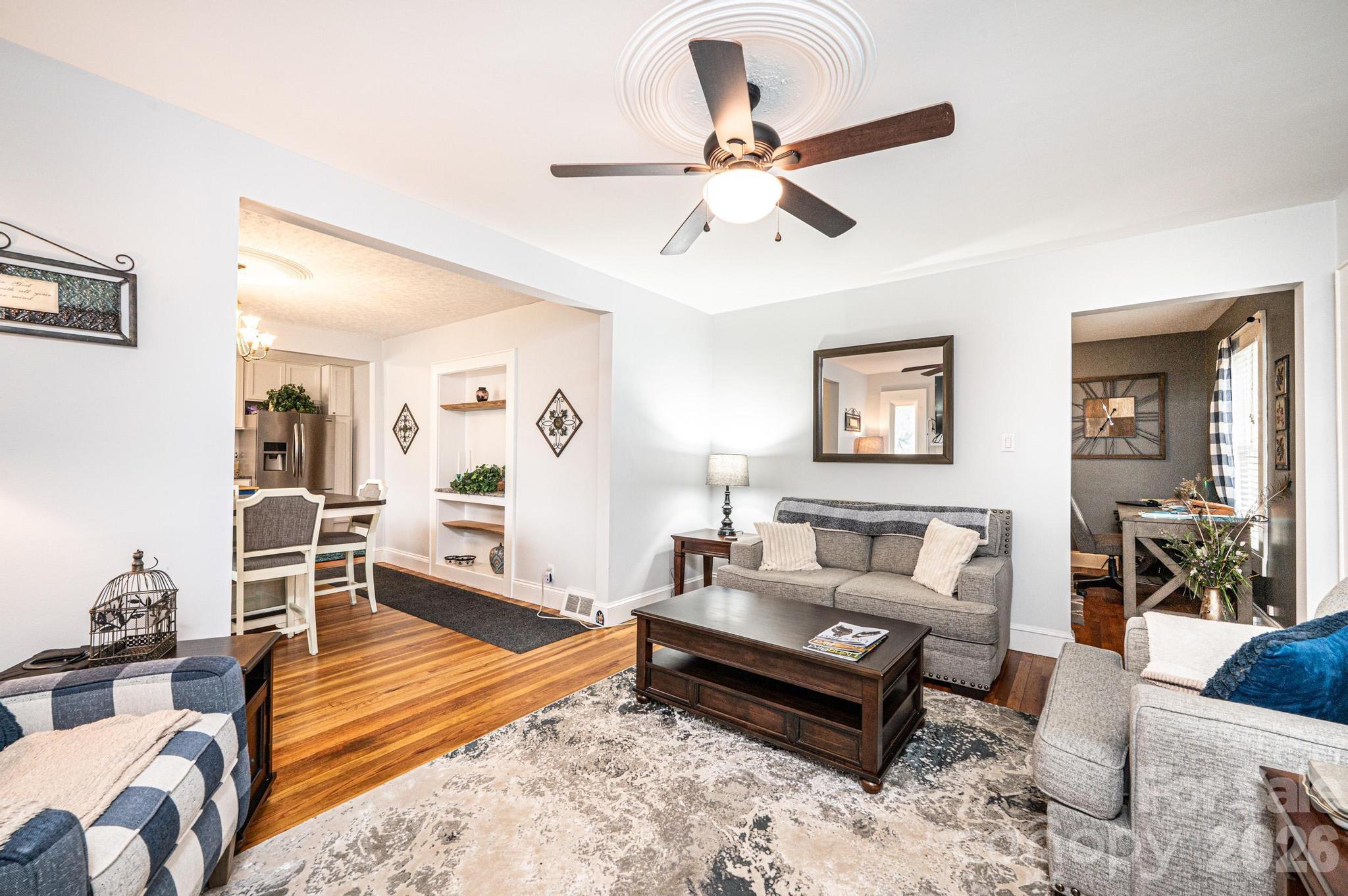 235 Spring Street Mocksville, NC 27028 - Photo 7 of 41 a living room with furniture and wooden floor