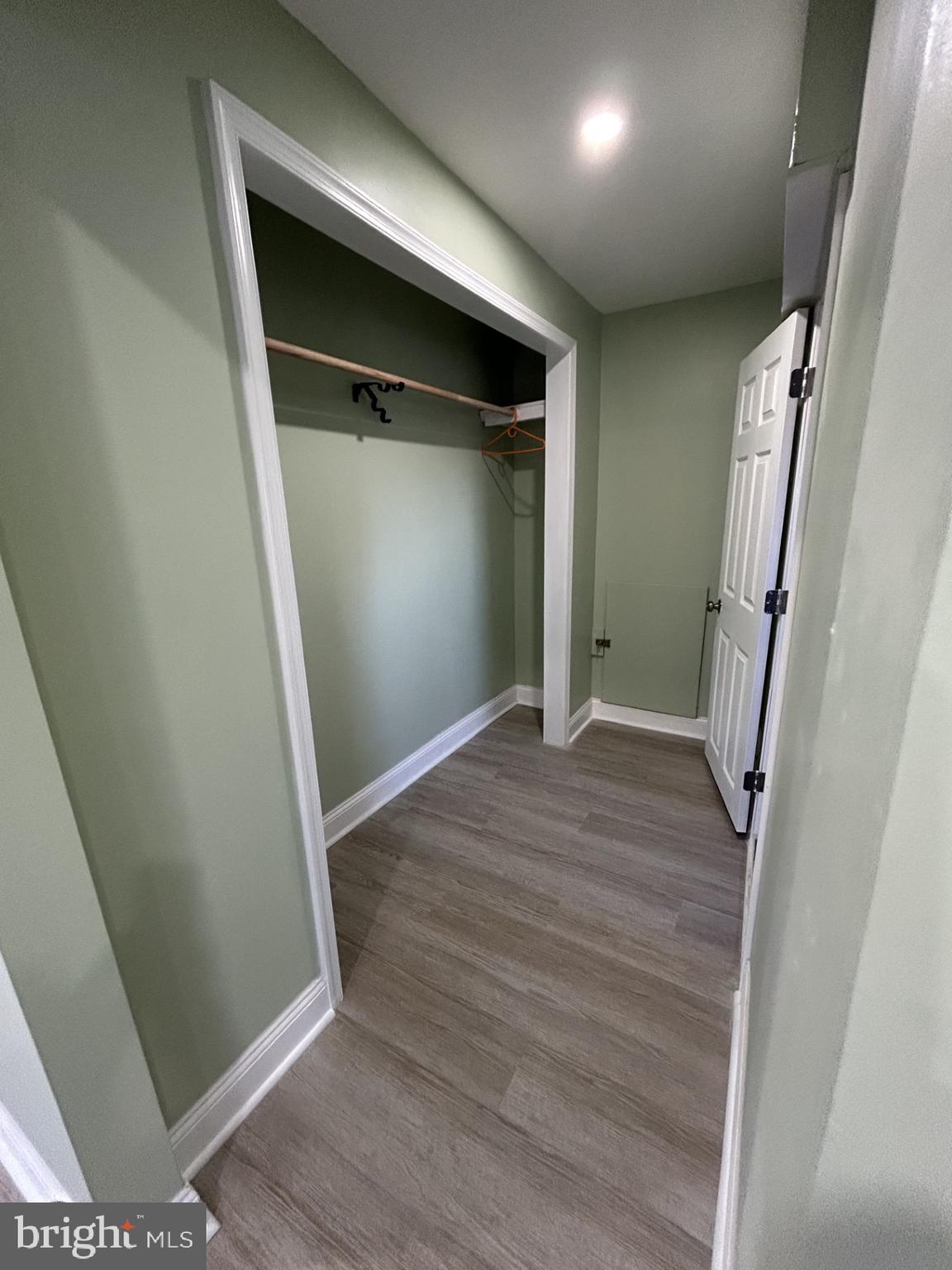 1420 Williams Avenue Levittown, PA 19057 - Photo 11 of 15 an empty room with wooden floor and entrance