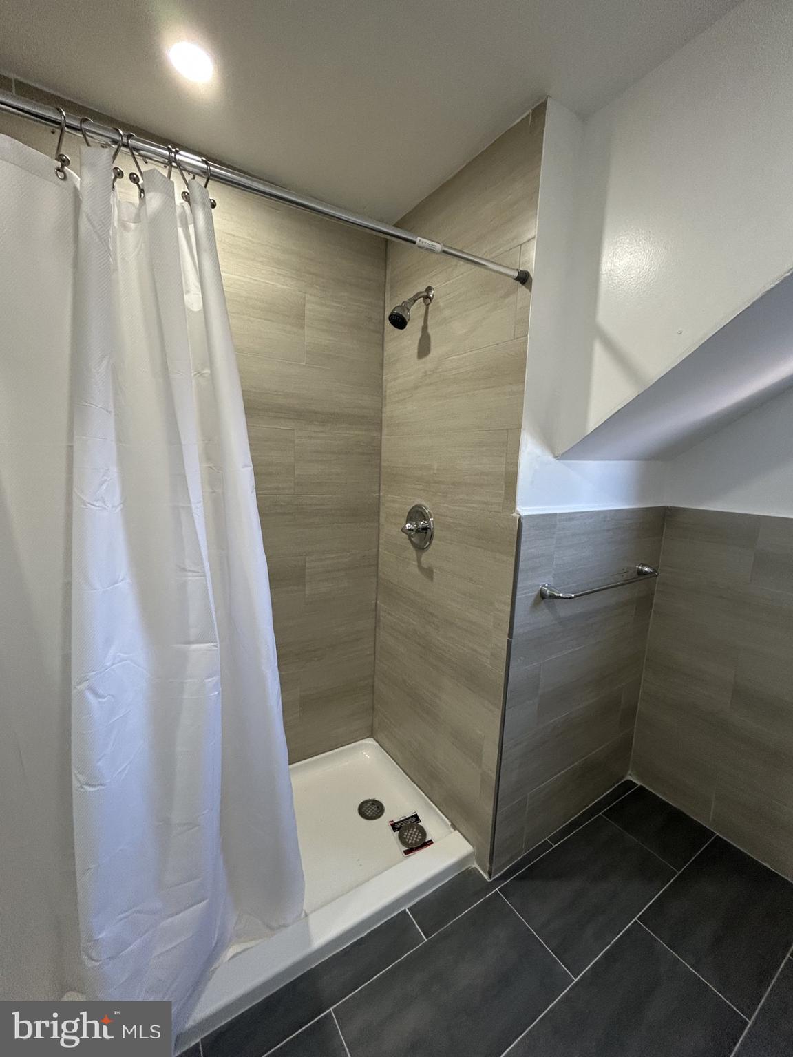 1420 Williams Avenue Levittown, PA 19057 - Photo 12 of 15 a bathroom with a shower and a sink