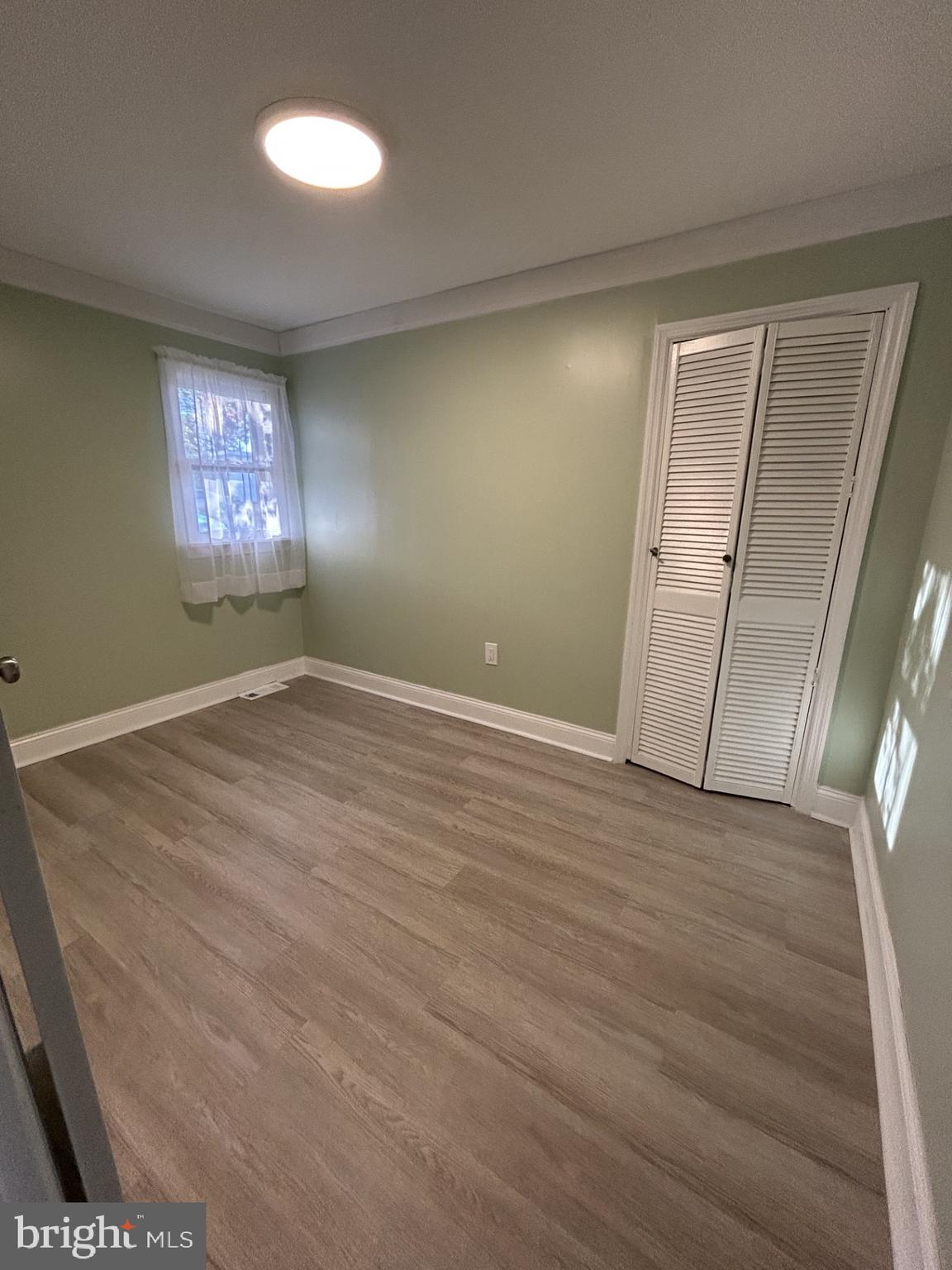 1420 Williams Avenue Levittown, PA 19057 - Photo 5 of 15 a view of an empty room with a window