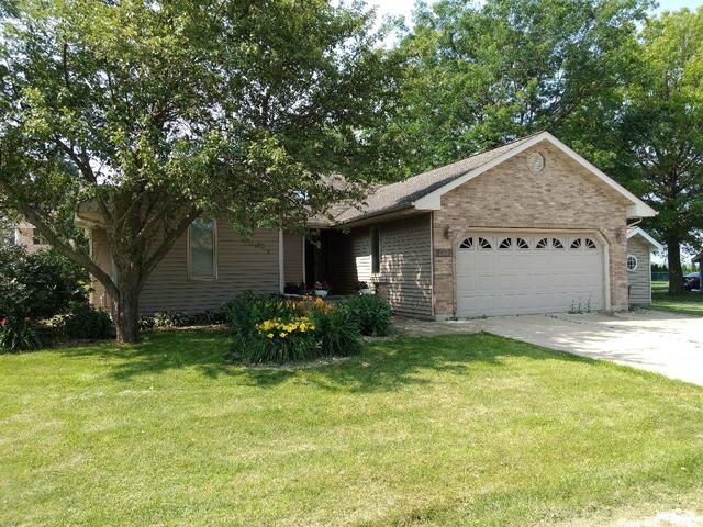 8420 South Main Street Rochelle, IL 61068 - Photo 1 of 24 a view of a house with a yard garage and tree