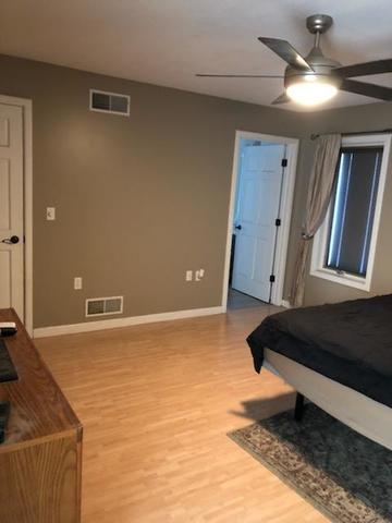 8420 South Main Street Rochelle, IL 61068 - Photo 14 of 24 a room with furniture and a ceiling fan
