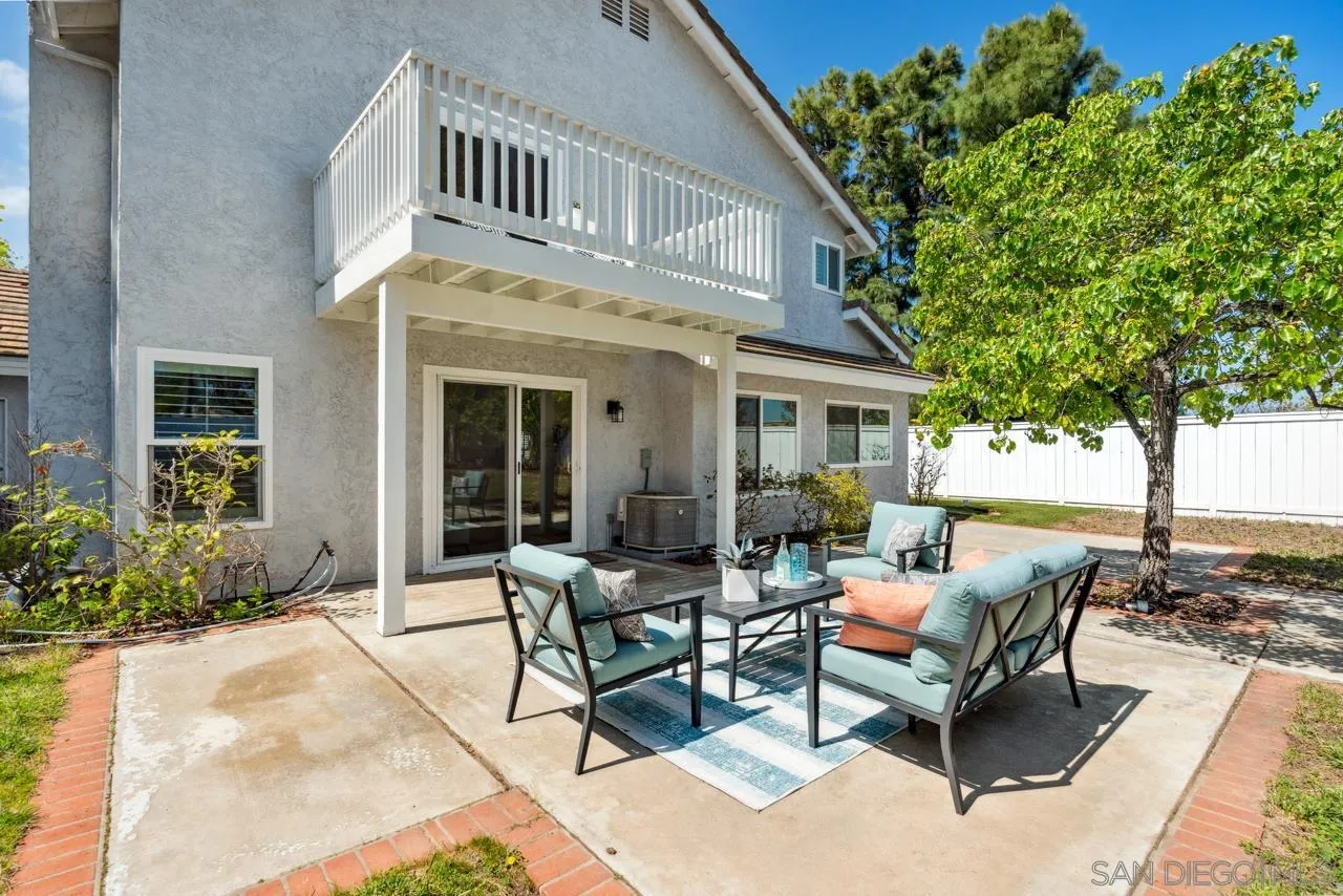 7914 Corte Cardo Carlsbad, CA 92009 - Photo 41 of 61 a view of a house with backyard and sitting area