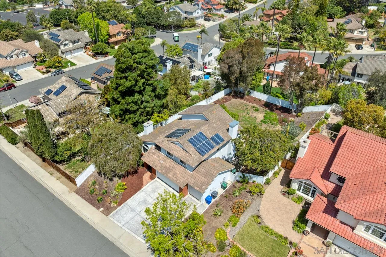 7914 Corte Cardo Carlsbad, CA 92009 - Photo 53 of 61 an aerial view of a house with a garden