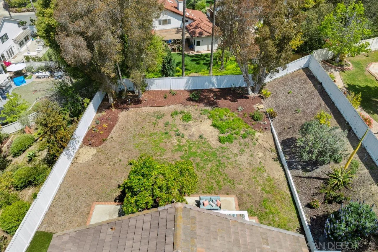 7914 Corte Cardo Carlsbad, CA 92009 - Photo 56 of 61 a view of a back yard with potted plants