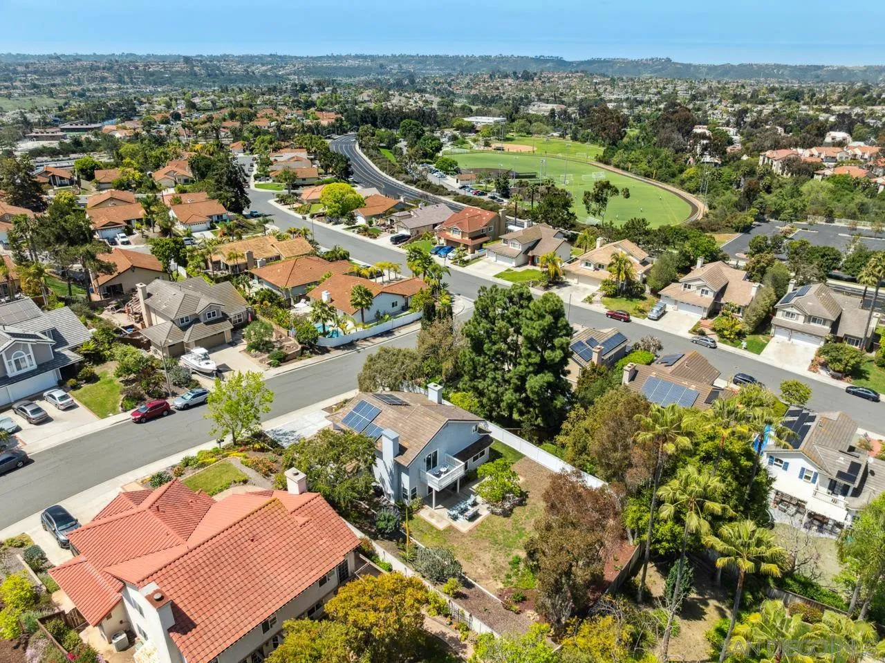 7914 Corte Cardo Carlsbad, CA 92009 - Photo 58 of 61 an aerial view of residential houses with outdoor space