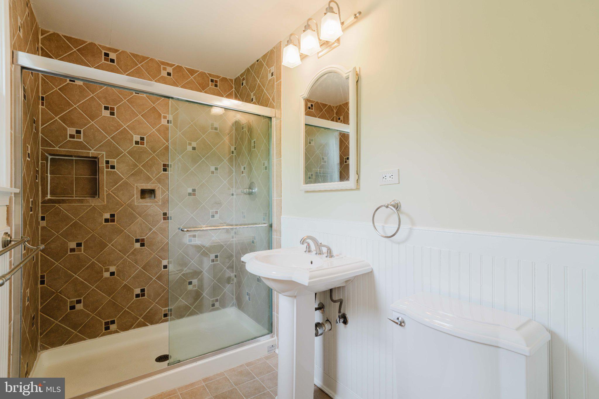 10200 Duvawn Place Silver Spring, MD 20902 - Photo 28 of 42 Elegant bathroom with modern finishes.