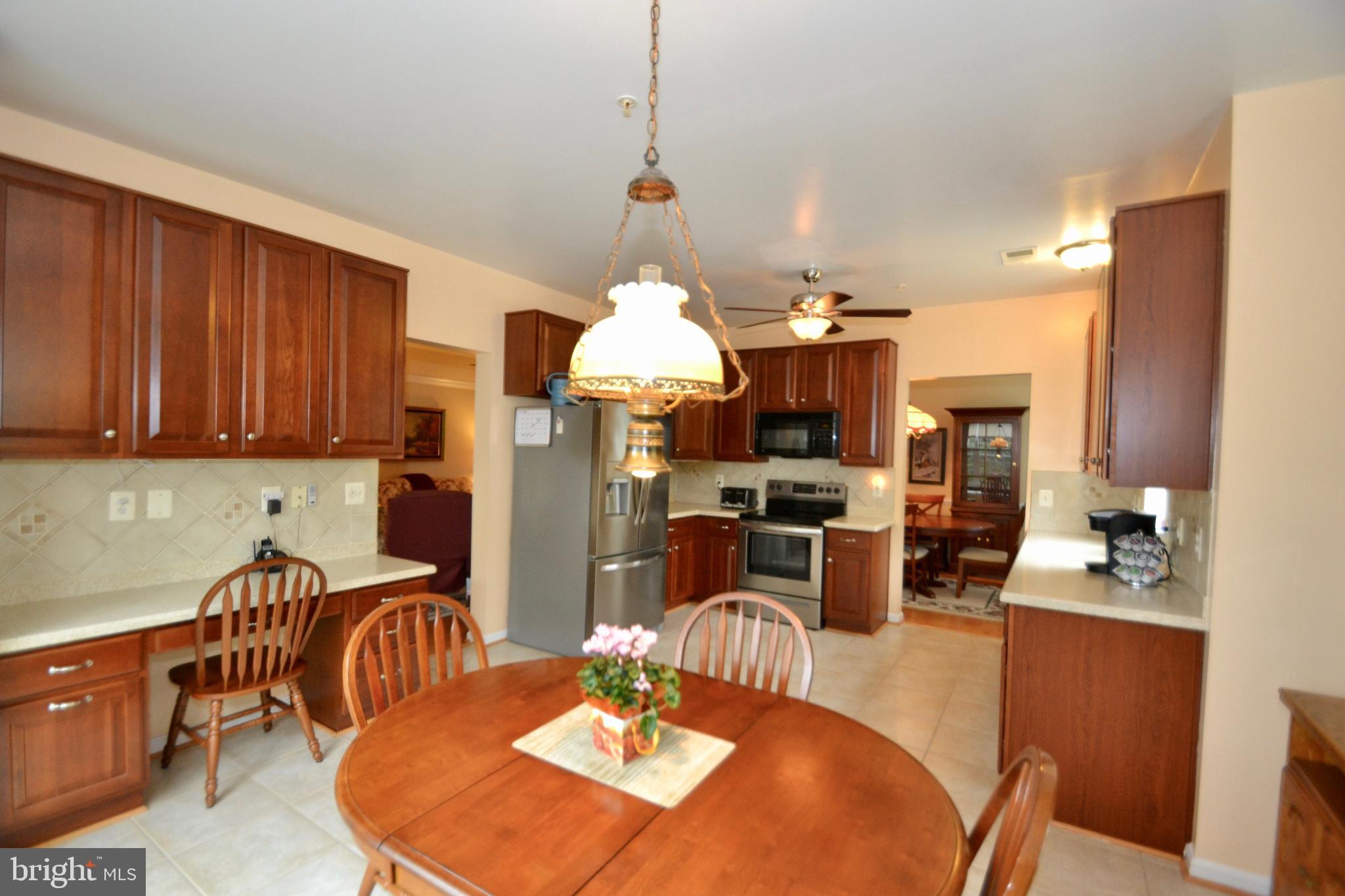 7335 Brookview Road, Unit 206 Elkridge, MD 21075 - Photo 8 of 37 Spacious Kitchen w/ Cherry Cabinets