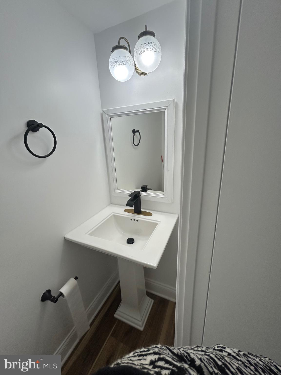 7036 Palamar Terrace Lanham, MD 20706 - Photo 21 of 34 a bathroom with a sink mirror and vanity
