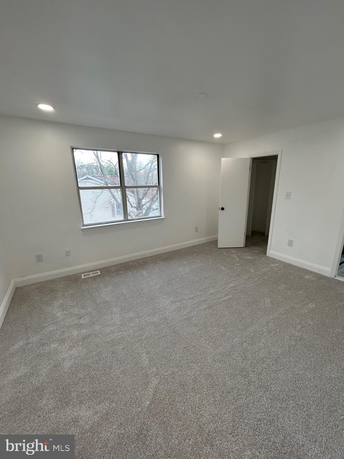 7036 Palamar Terrace Lanham, MD 20706 - Photo 24 of 34 an empty room with windows and closet