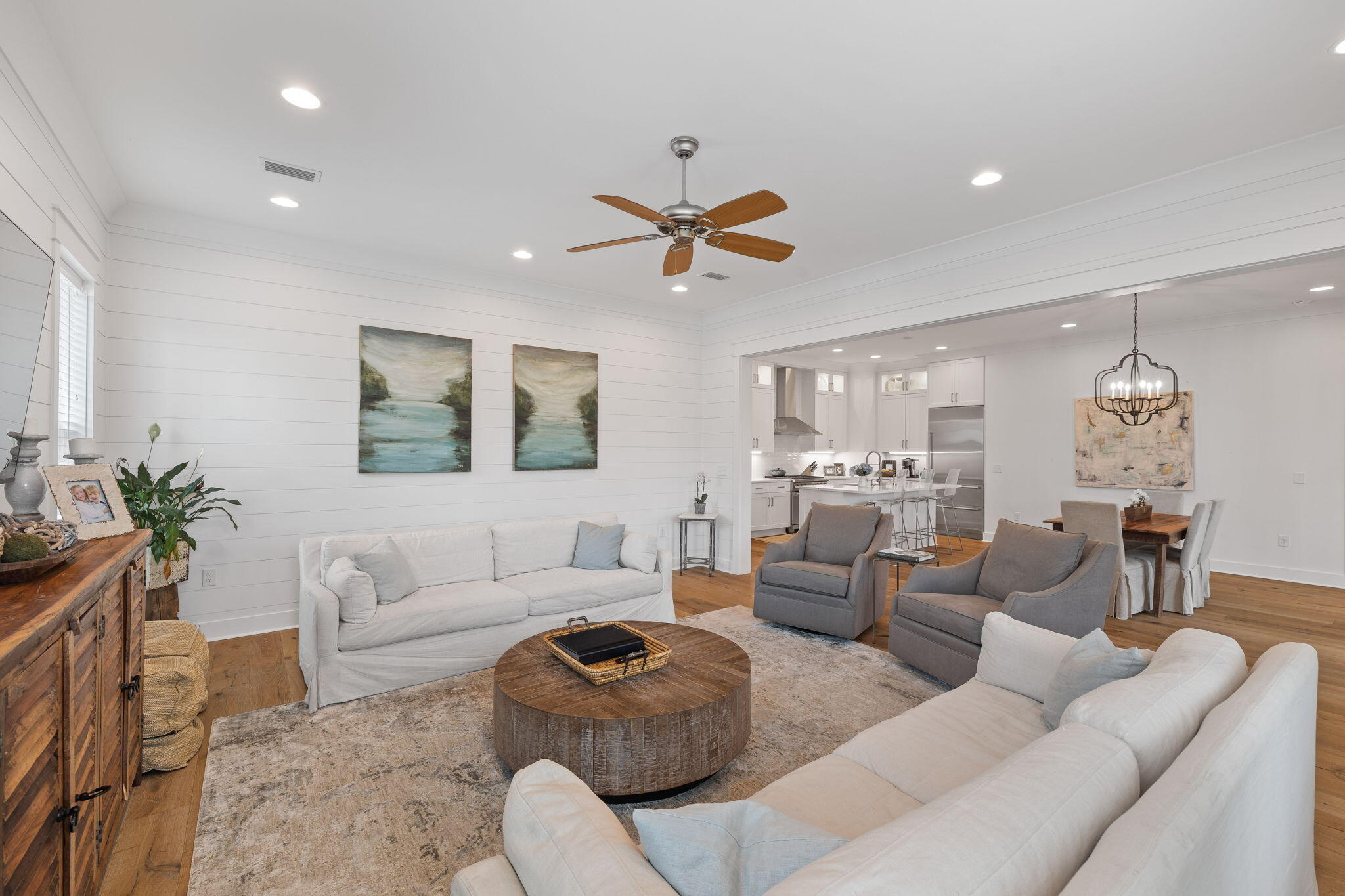 158 Trailhead Drive Inlet Beach, FL 32461 - Photo 14 of 35 a living room with furniture a large window and a chandelier