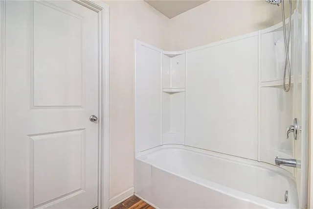 a view of storage and utility room with washer and dryer