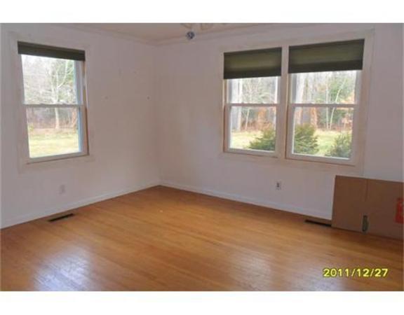 116 Old Stage Road Westfield, MA 01085 - Photo 4 of 8 a view of an empty room with a window
