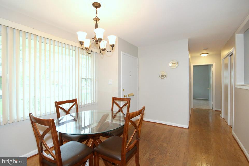5216 Dalton Road Springfield, VA 22151 - Photo 2 of 27 a view of a dining room with furniture window and wooden floor