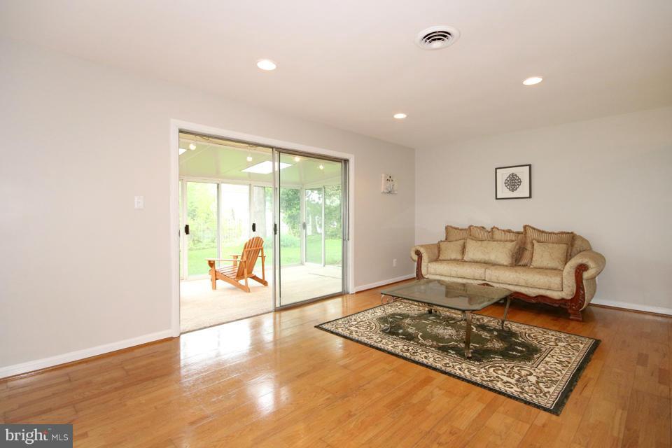5216 Dalton Road Springfield, VA 22151 - Photo 11 of 27 a living room with couch and a table