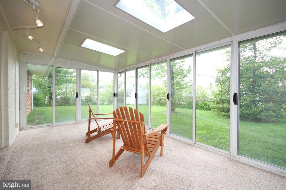 5216 Dalton Road Springfield, VA 22151 - Photo 16 of 27 a living room with hardwood floor and garden