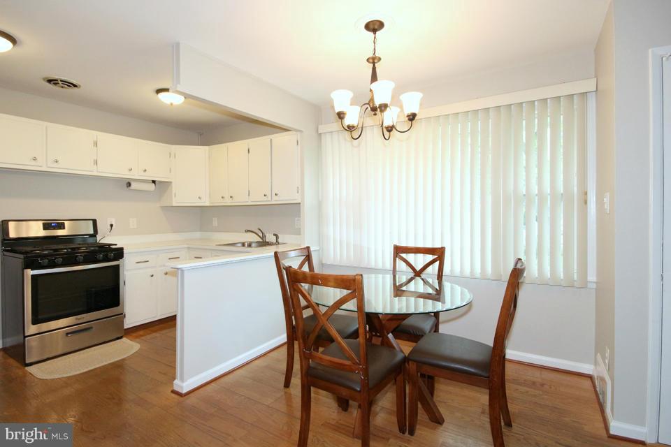 5216 Dalton Road Springfield, VA 22151 - Photo 3 of 27 a view of a dining room with furniture and chandelier