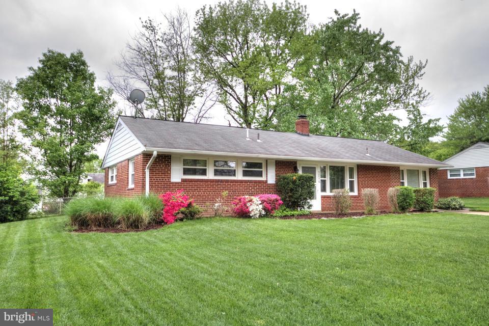 5216 Dalton Road Springfield, VA 22151 - Photo 27 of 27 a front view of house with yard and green space