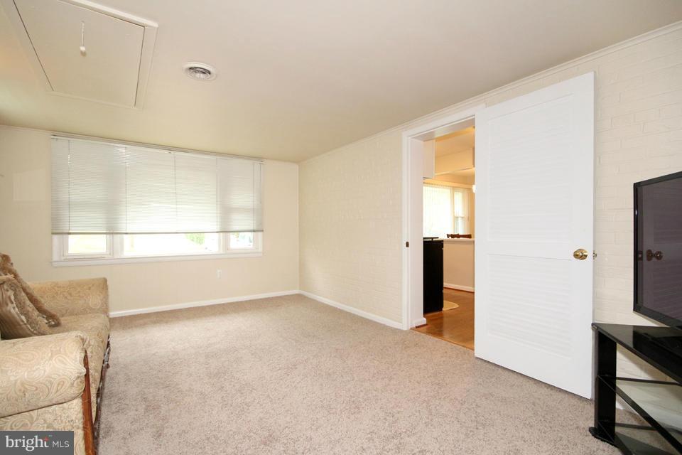 5216 Dalton Road Springfield, VA 22151 - Photo 10 of 27 a view of an empty room with a window