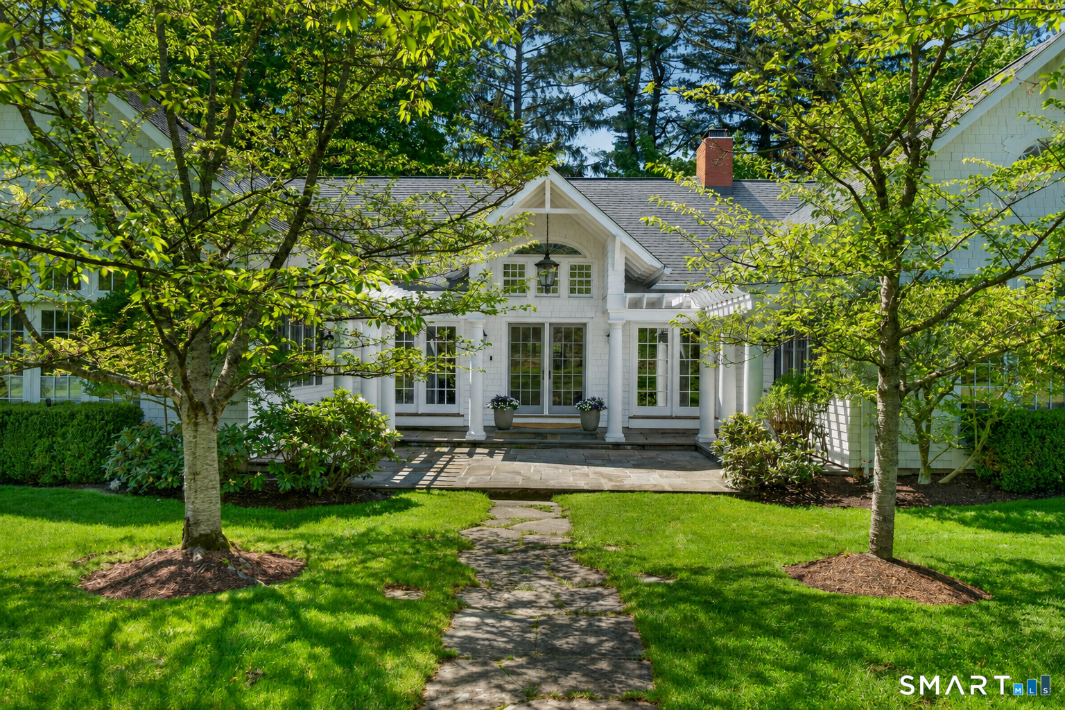 41 Peaceable Street Ridgefield, CT 06877 - Photo 2 of 40 front view of a house with a yard