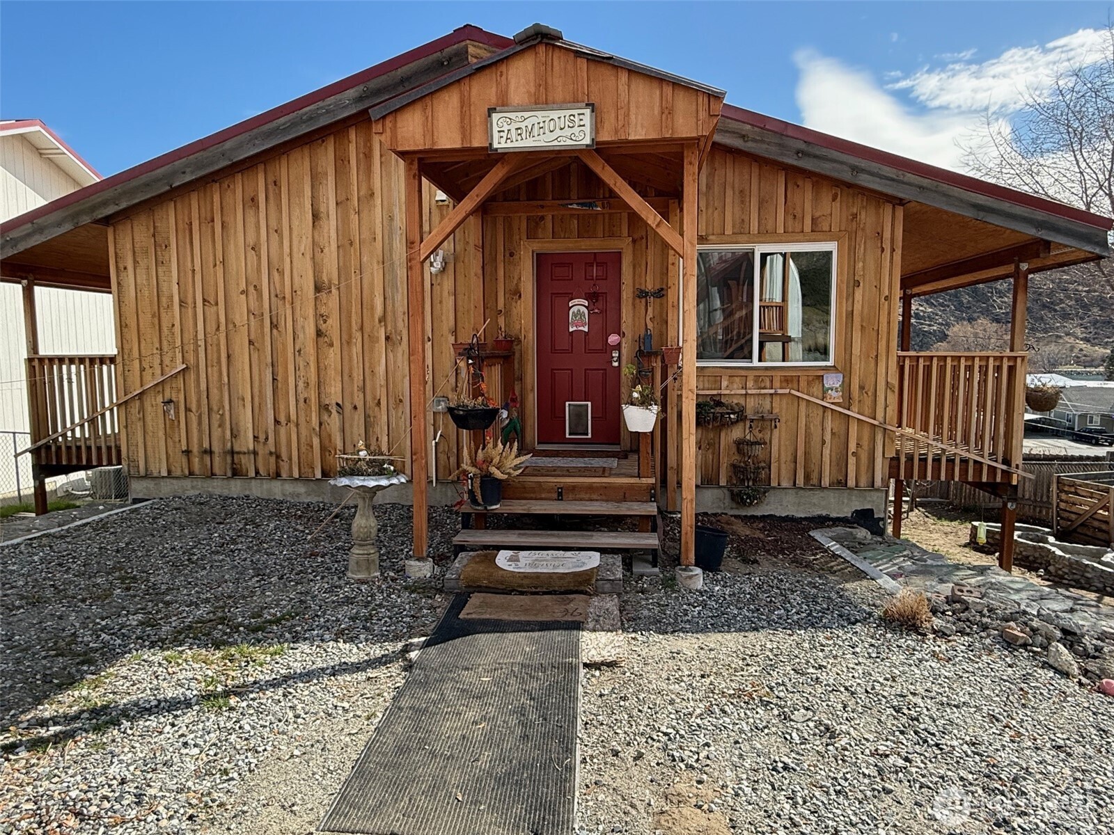 a front view of a house with garden