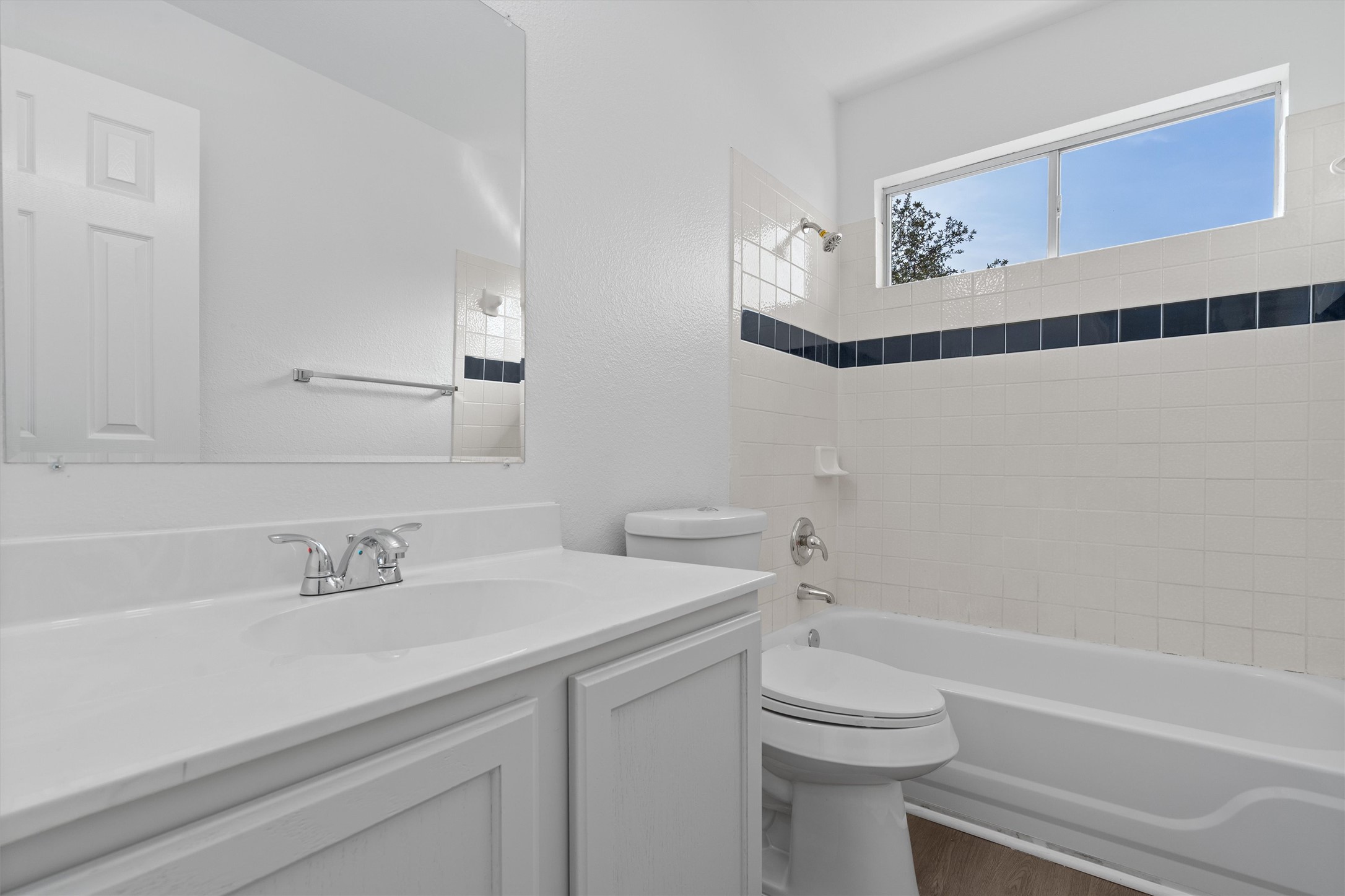 2101 Jester Farms Road Round Rock, TX 78664 - Photo 20 of 24 Full bathroom with shower / washtub combination, vanity, and dark wood-style flooring