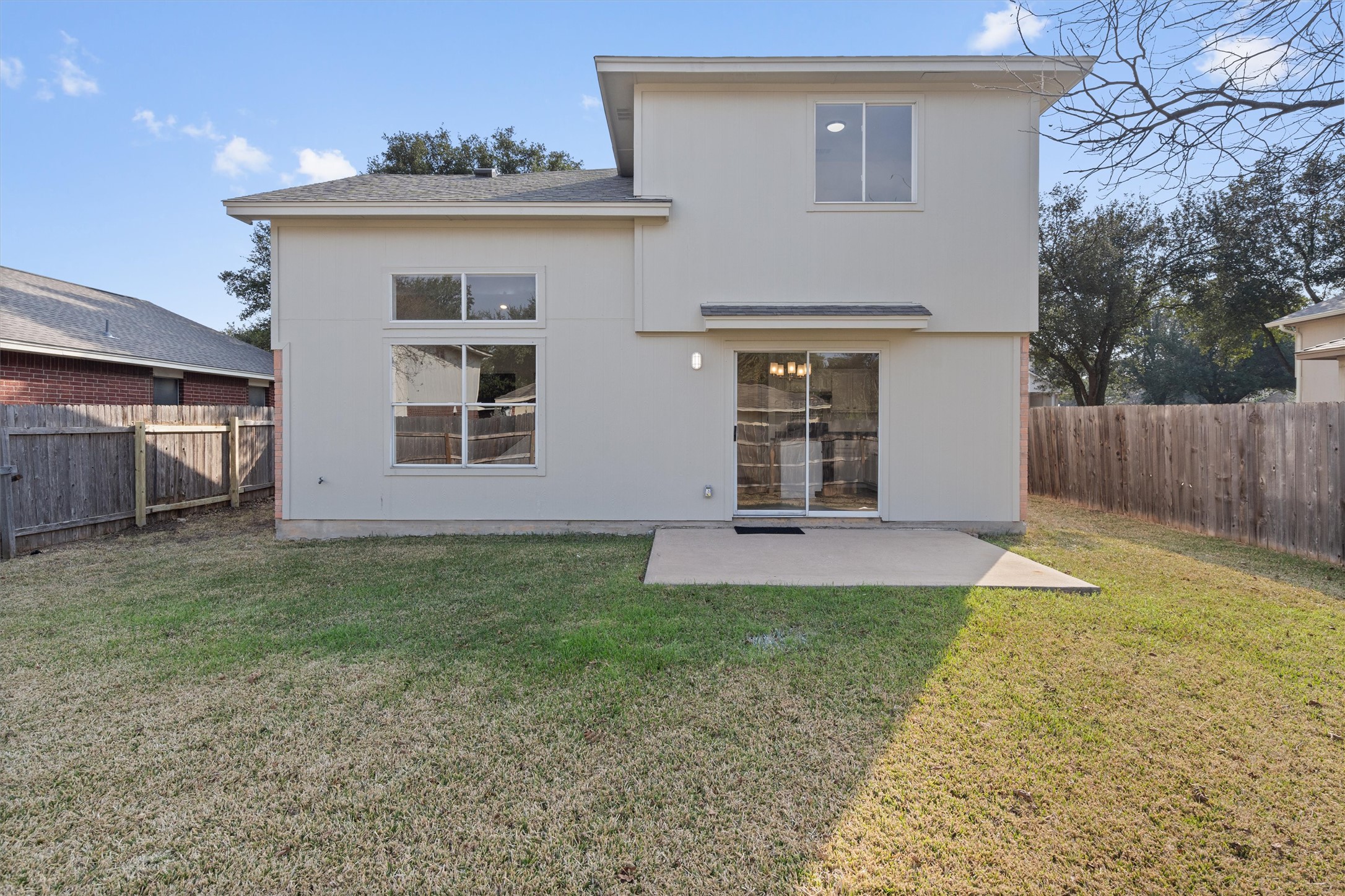 2101 Jester Farms Road Round Rock, TX 78664 - Photo 23 of 24 Back of house featuring a patio area and a fenced backyard
