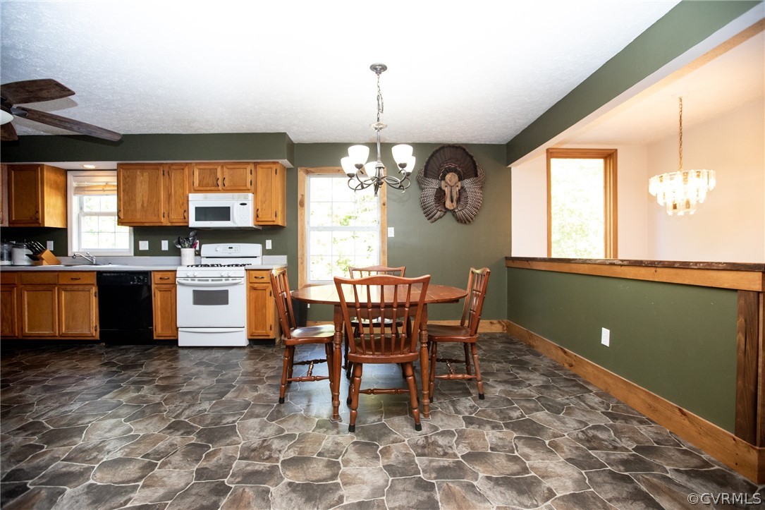 2232 Mt Pleasant Road Pamplin, VA 23958 - Photo 11 of 50 a view of a dining room with furniture window and outside view