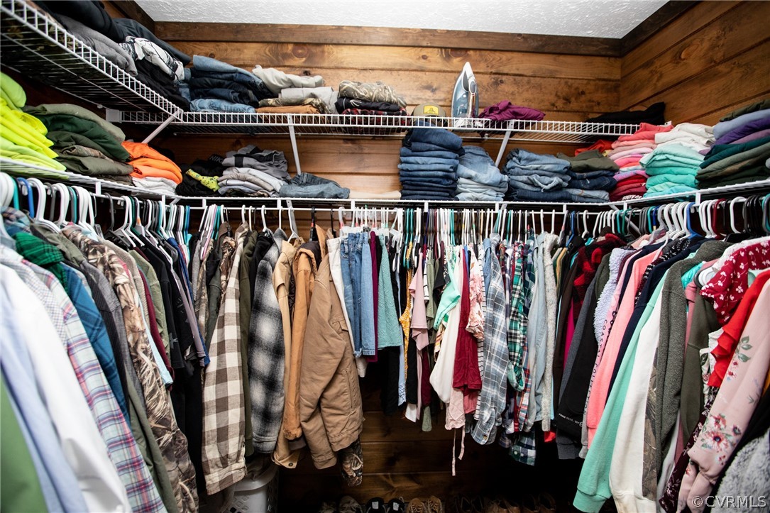 2232 Mt Pleasant Road Pamplin, VA 23958 - Photo 18 of 50 a view of walk in closet with clothes and shoes