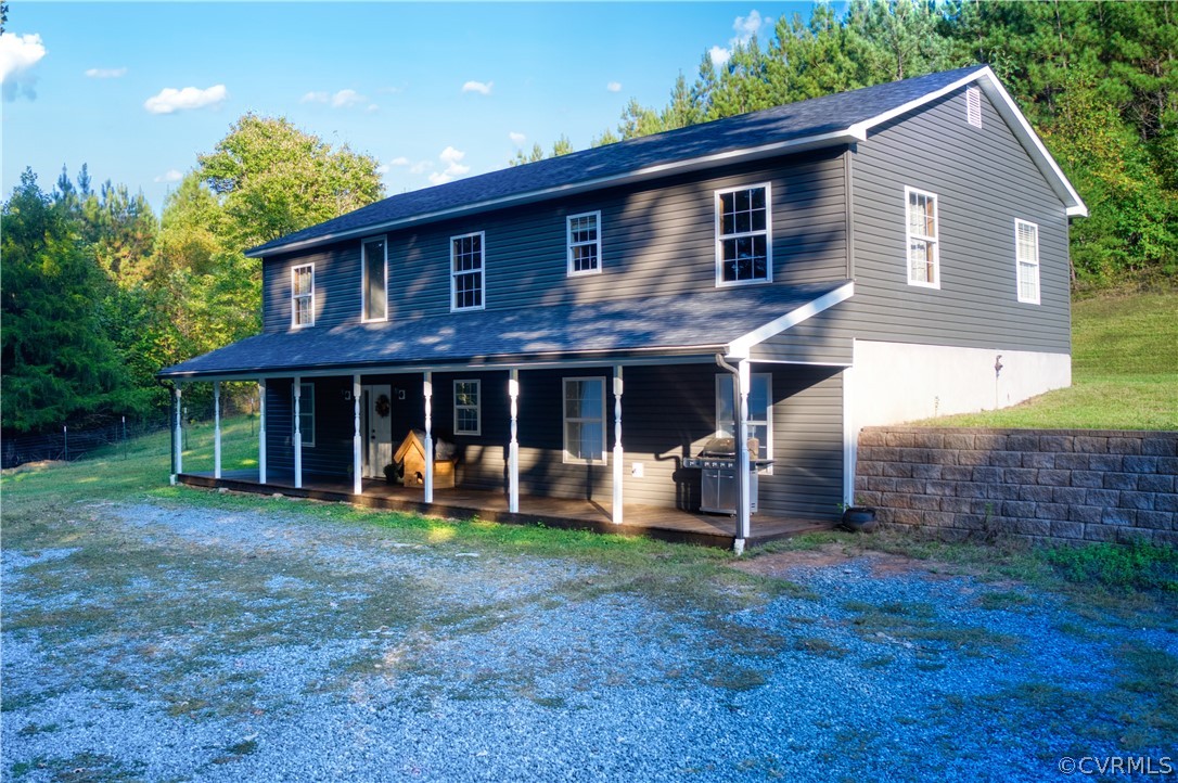 2232 Mt Pleasant Road Pamplin, VA 23958 - Photo 2 of 50 a front view of a house with garden