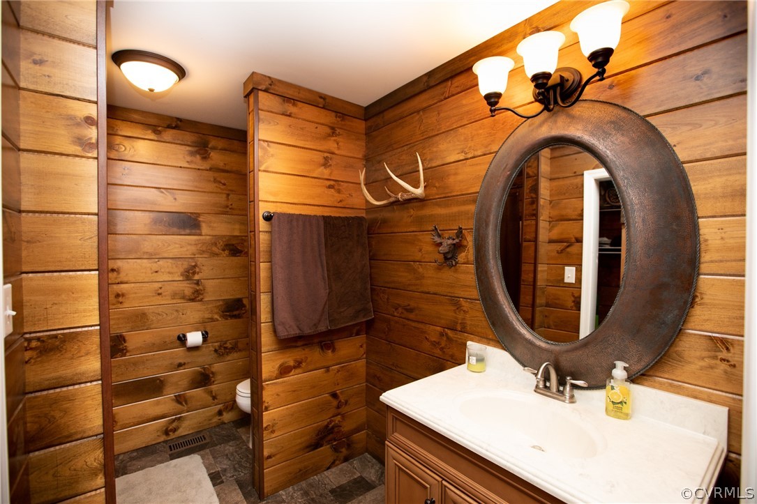 2232 Mt Pleasant Road Pamplin, VA 23958 - Photo 27 of 50 a bathroom with a sink and a mirror