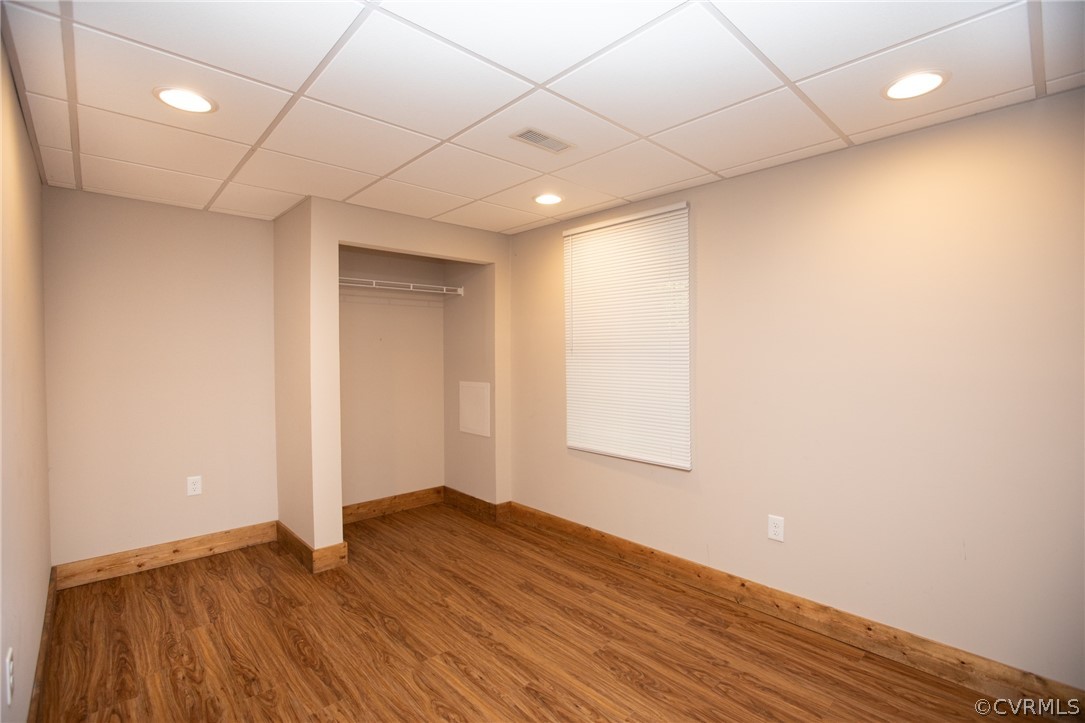 2232 Mt Pleasant Road Pamplin, VA 23958 - Photo 34 of 50 a view of an empty room with wooden floor and a window