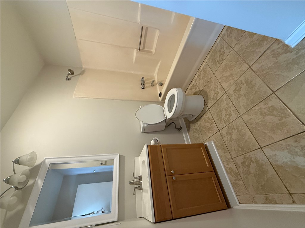 125 Maple Street, Unit 110 Pendleton, SC 29670 - Photo 15 of 18 A well-maintained shared bathroom with a ceramic tile floor and a standard tub and shower combination.