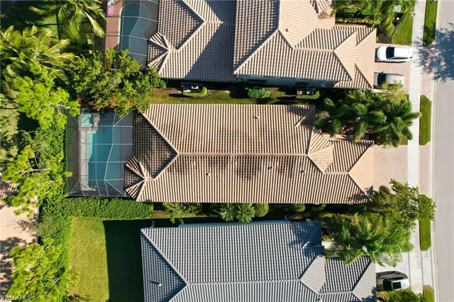 a aerial view of a house with a yard