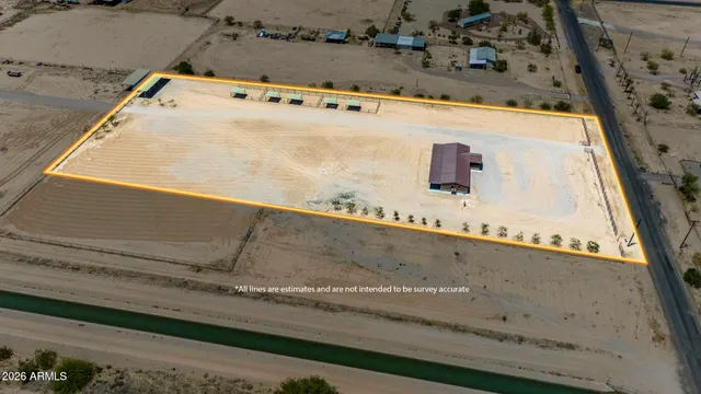 a kitchen with a sink a counter top space and stainless steel appliances