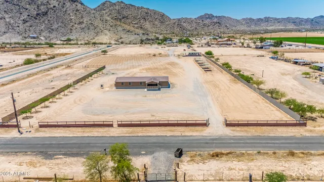 a view of a kitchen with furniture and a window