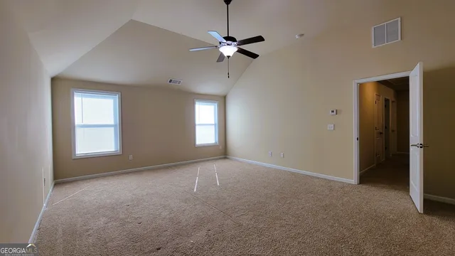 a view of bathroom with wooden floor