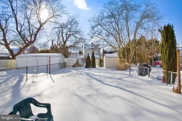 a house with trees in front of it