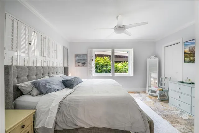 a bathroom with a double vanity sink mirror and shower