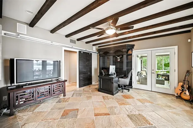 a view of a hallway with an outdoor space