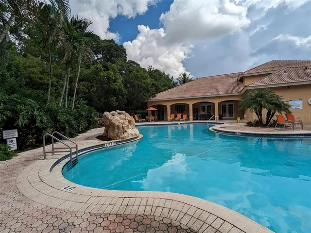 a view of outdoor space yard and swimming pool