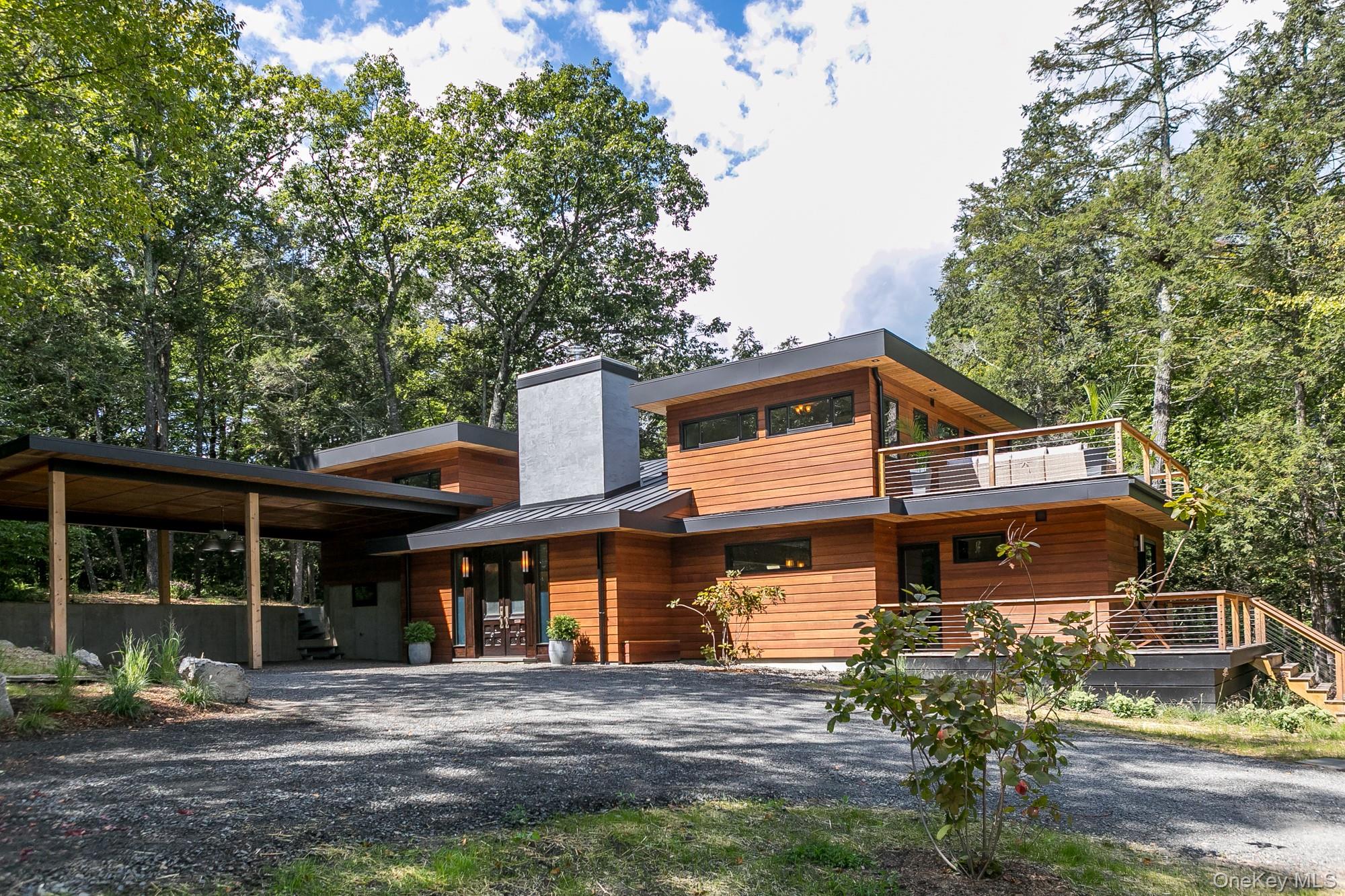 35 Fern Hollow Road Stone Ridge, NY 12484 - Photo 1 of 40 a front view of a house with garden
