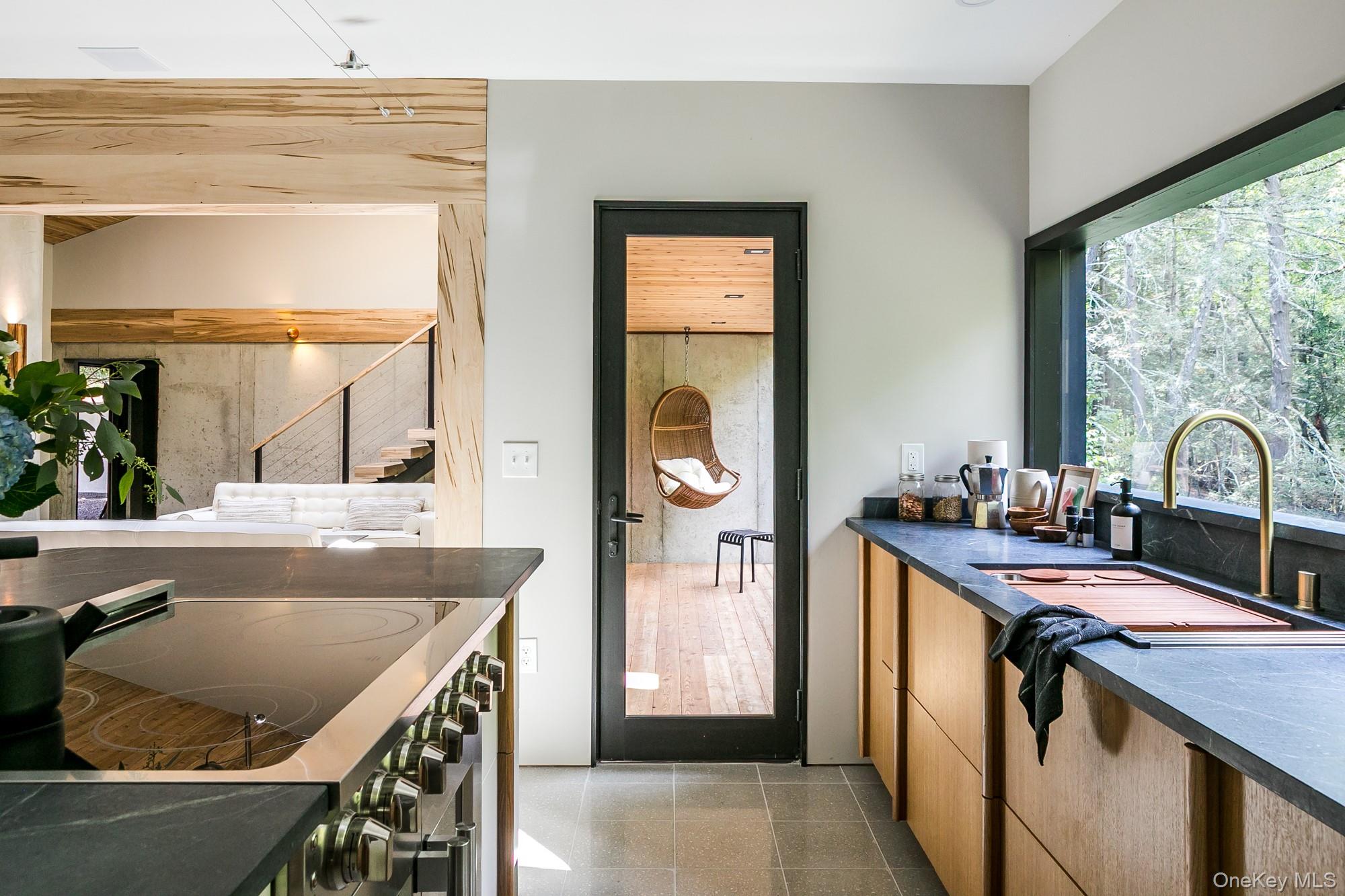 35 Fern Hollow Road Stone Ridge, NY 12484 - Photo 11 of 40 a kitchen with a sink and a refrigerator