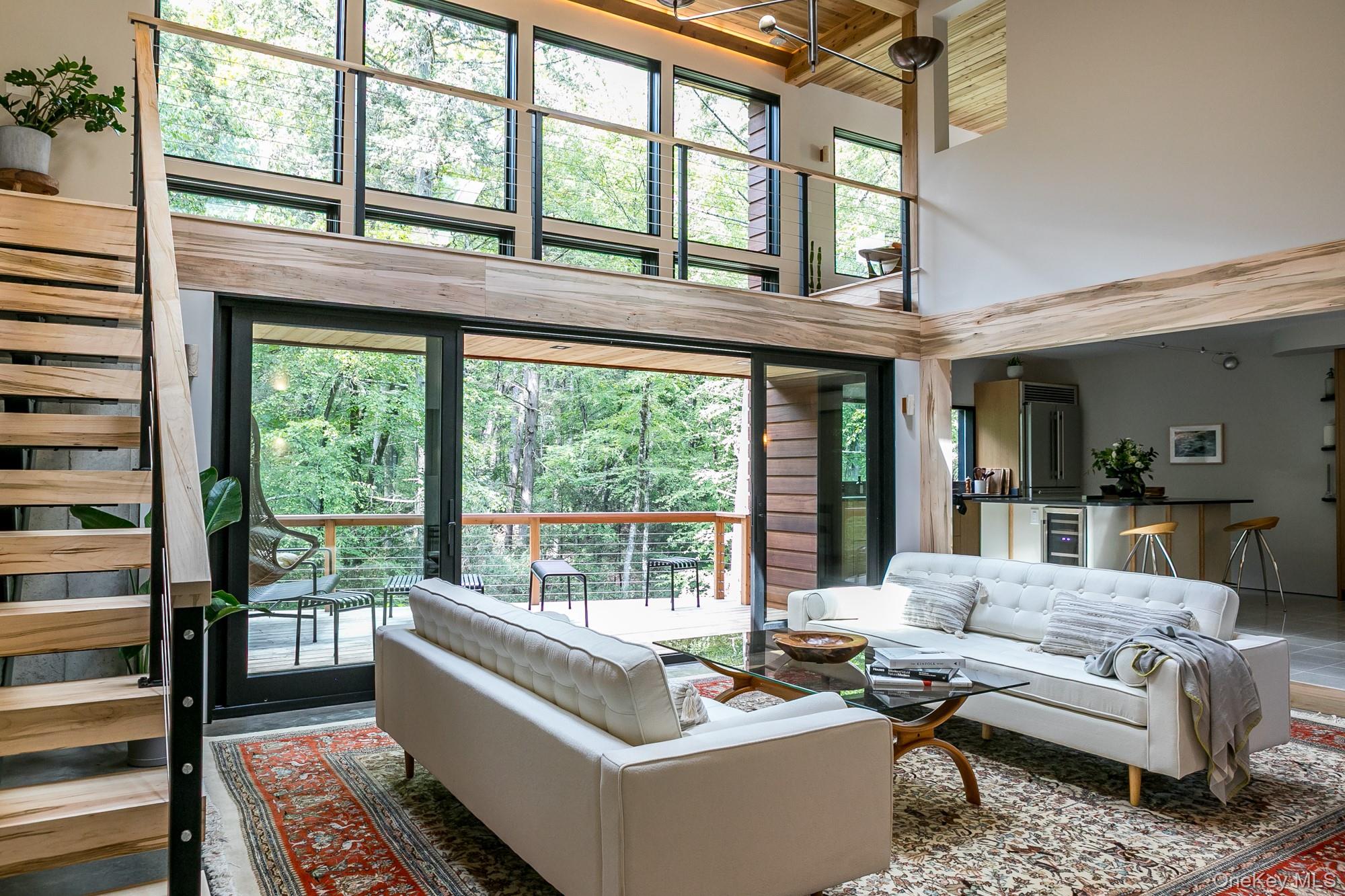 35 Fern Hollow Road Stone Ridge, NY 12484 - Photo 20 of 40 a living room with furniture and large windows