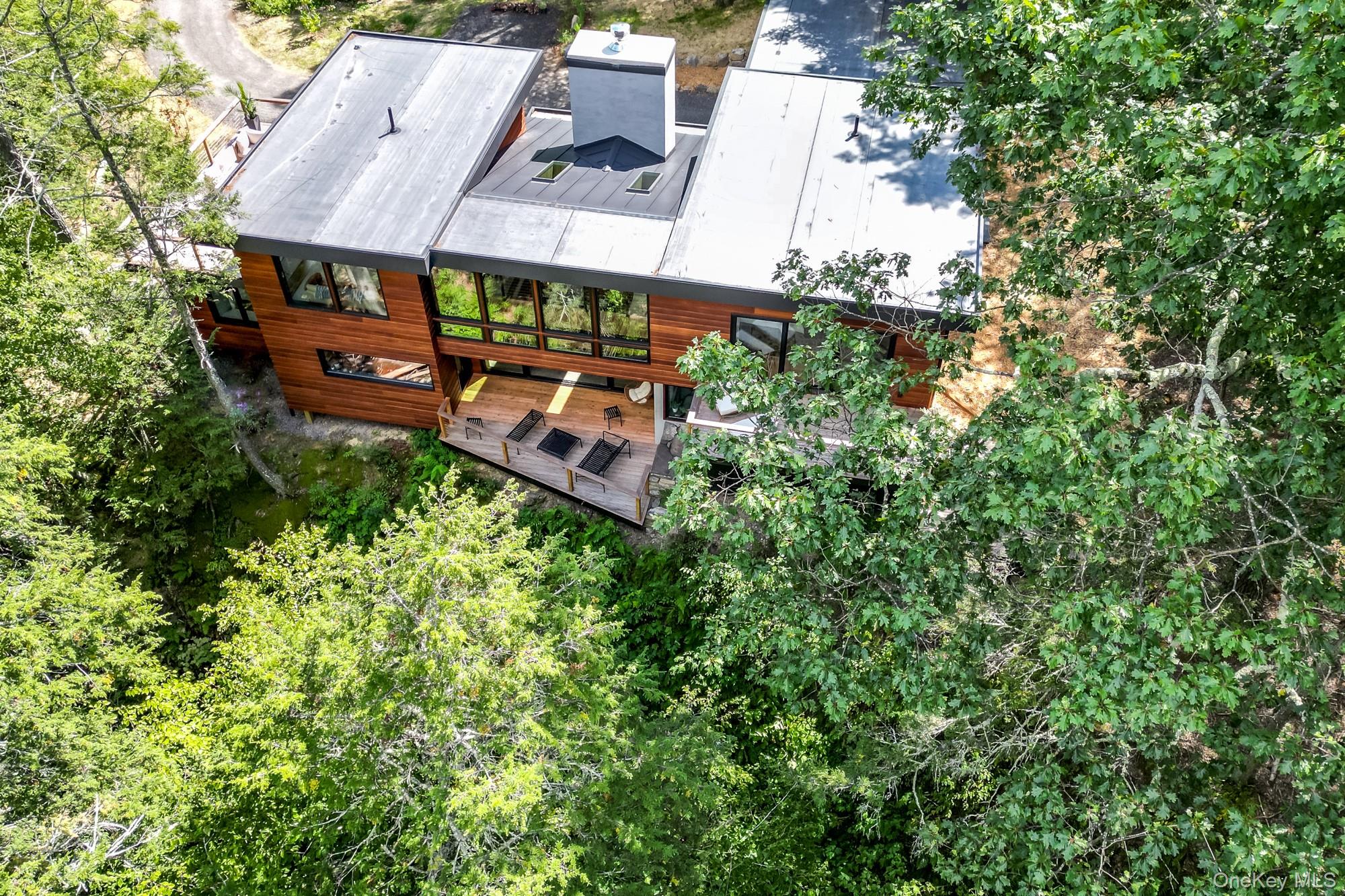 35 Fern Hollow Road Stone Ridge, NY 12484 - Photo 2 of 40 an aerial view of a house with swimming pool a yard and a large tree