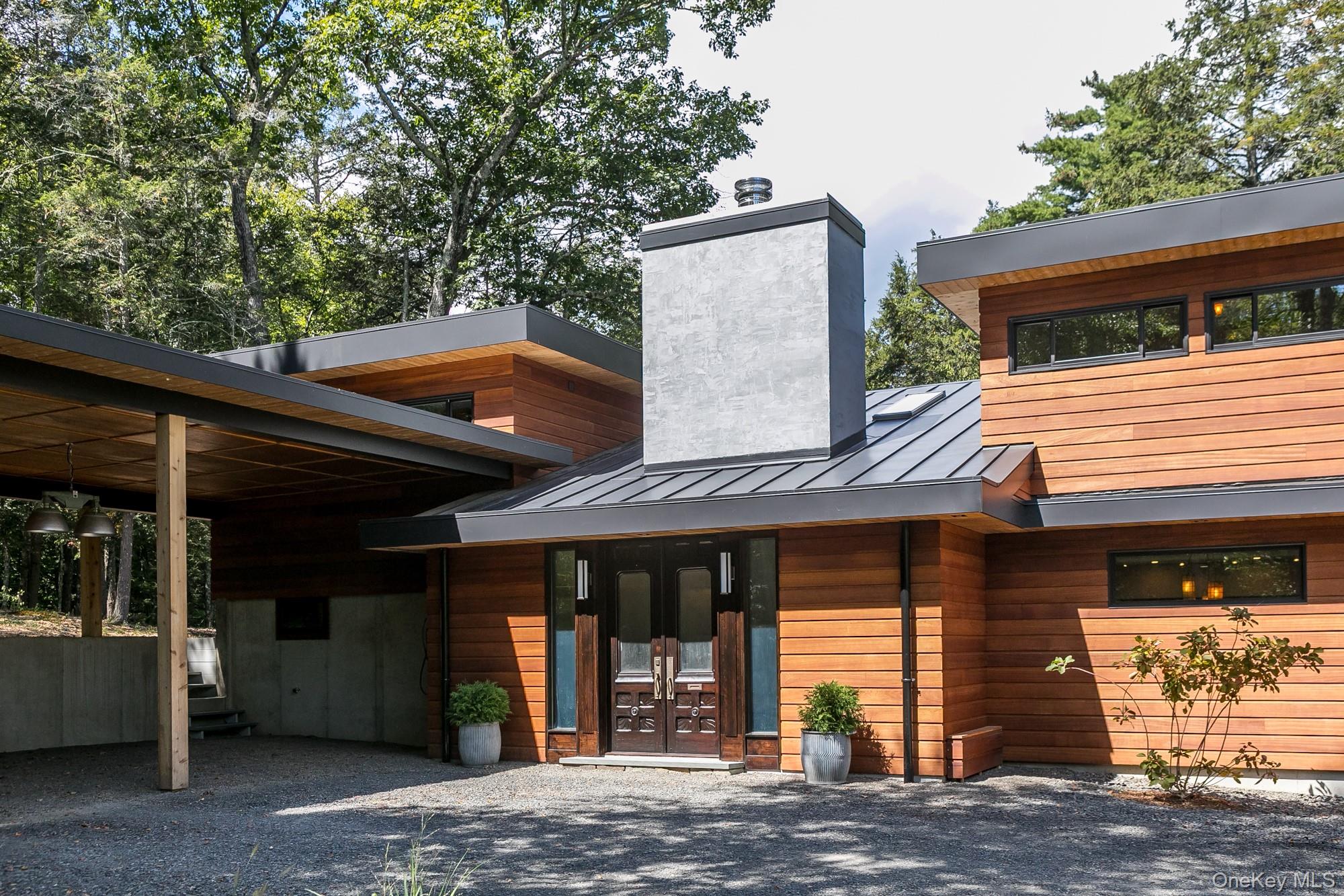 35 Fern Hollow Road Stone Ridge, NY 12484 - Photo 5 of 40 a front view of a house with garden