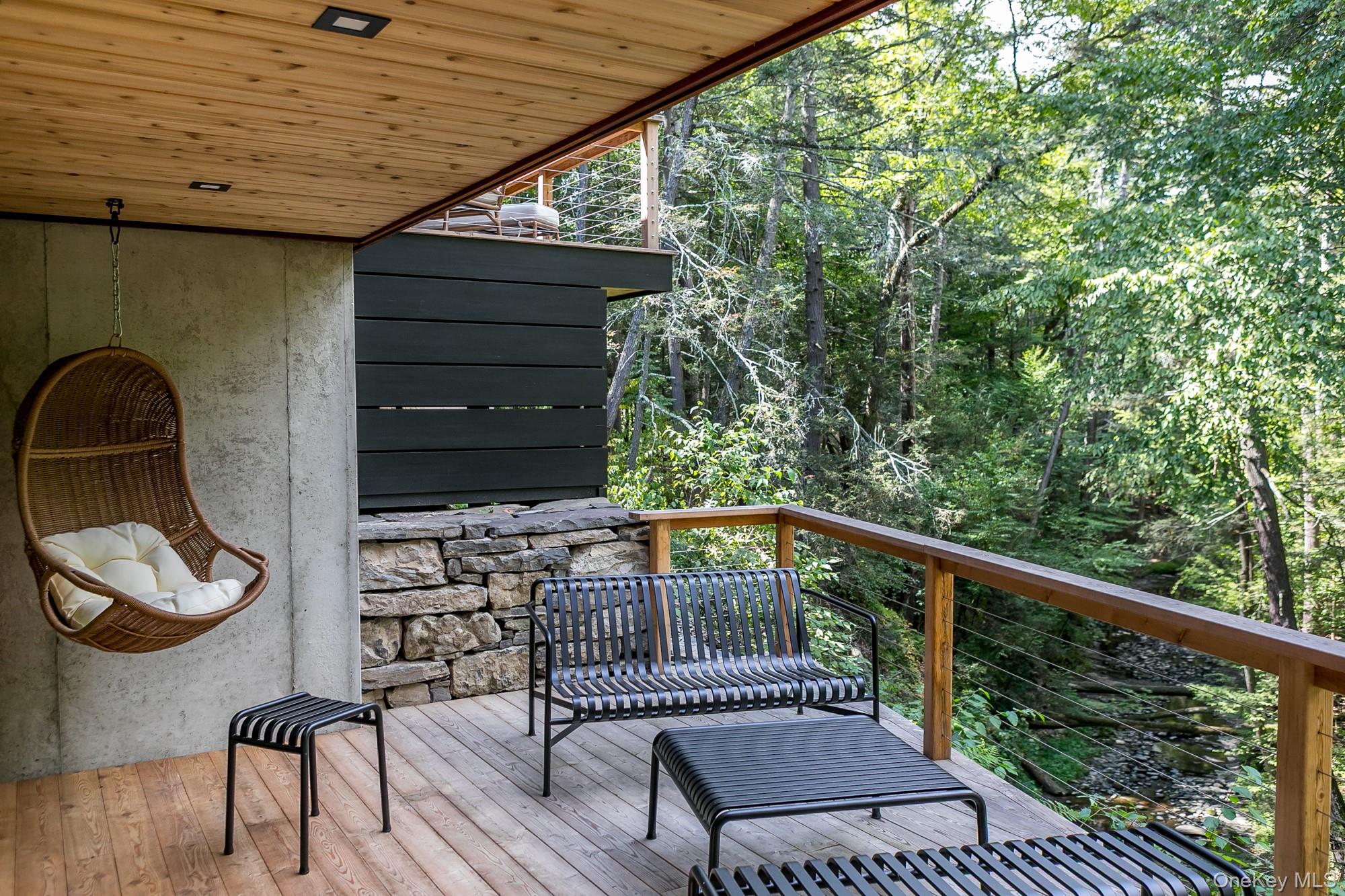 35 Fern Hollow Road Stone Ridge, NY 12484 - Photo 10 of 40 a balcony view with a seating space